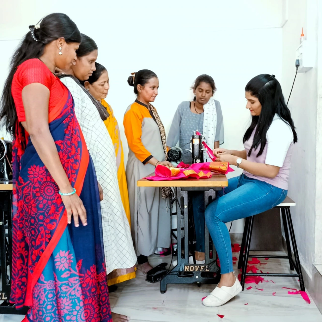 Trained hundreds of women in tailoring